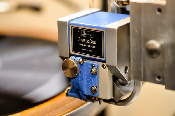 Close-up of a lacquer cutter on a lathe machine